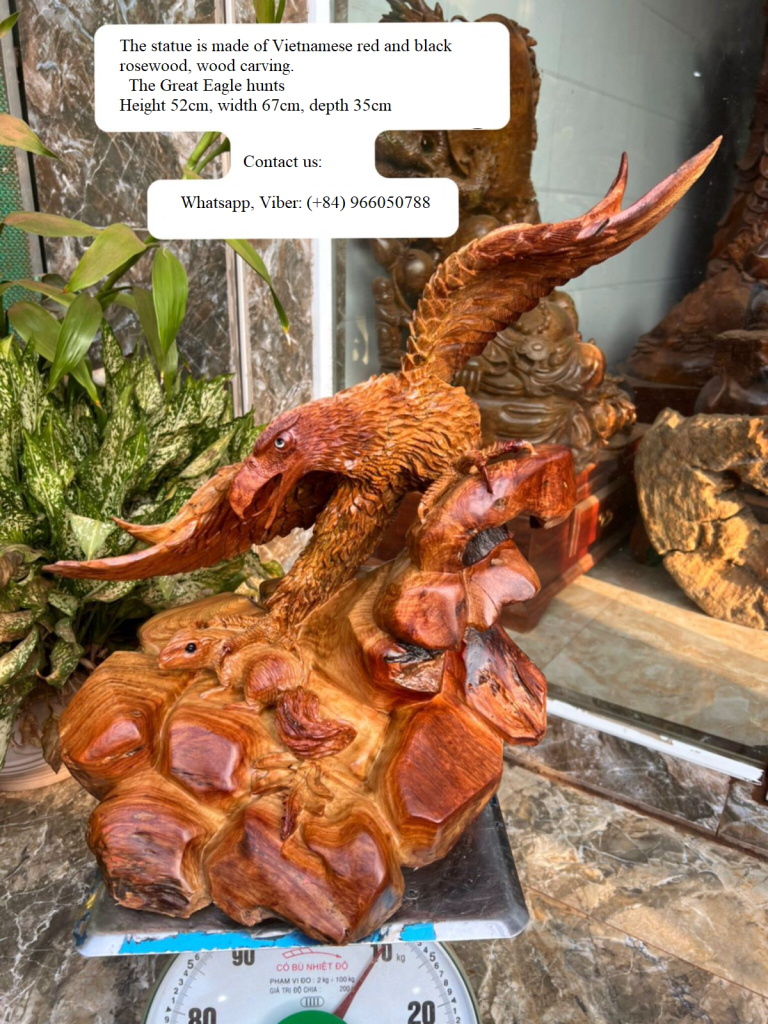 The statue is made of Vietnamese red rosewood,